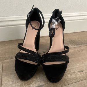 Black bedazzled heels size 6.5